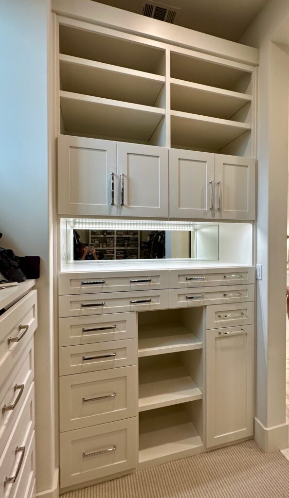 closet built-in with drawers and adj shelving